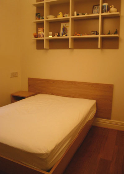 bed + overhead shelves